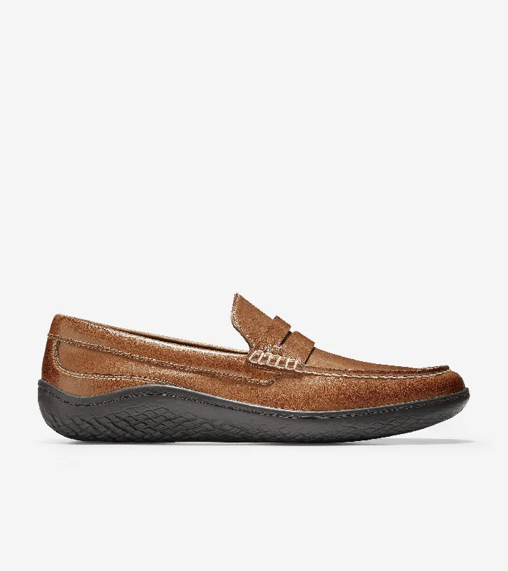 Men's loafers with a perforated leather upper for ventilation Men's loafers with a perforated leather upper for ventilation MøtoGrand Traveler Moc Penny Loafer Men's loafers with a perforated leather upper for ventilation Men's loafers with a perforated leather upper for ventilation MøtoGrand Traveler Moc Penny Loafer