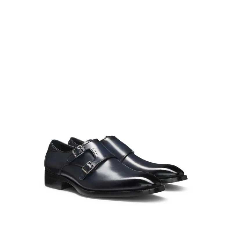 Men's formal shoes with a contrast stitching detail Men's formal shoes with a contrast stitching detail Double-strap monk shoes in burnished leather