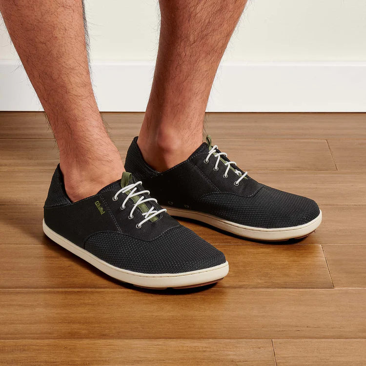 Men's casual shoes with a logo patch on the tongue Olukai Nohea Moku Black Men's