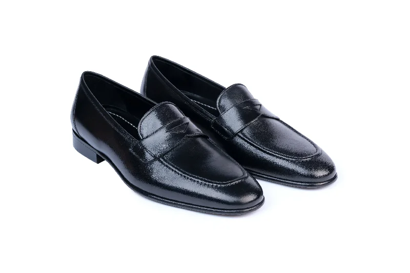 Men's formal shoes with a wingtip designCarlito Penny Loafer
