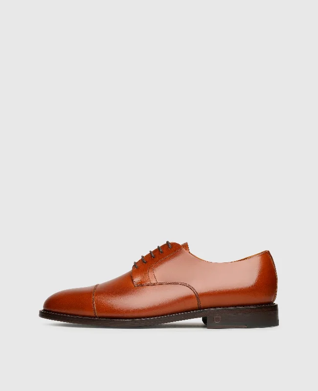 Men's boat shoes with a branded logo on the sideWinston CD - Cognac