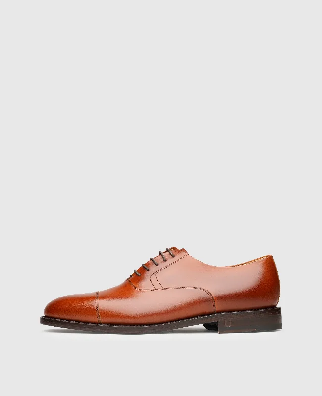 Men's boat shoes with a contrast stitchingWinston CO - Cognac