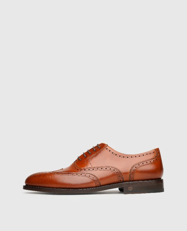 Men's boat shoes with a branded logo on the sideWinston FBO - Cognac
